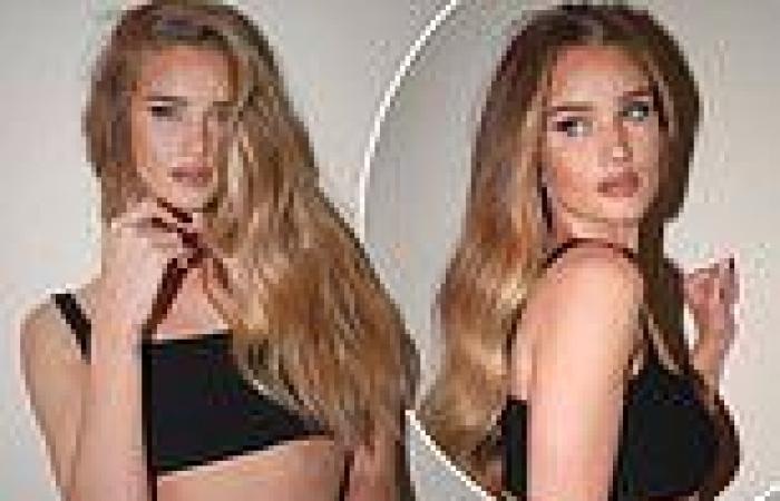 Rosie Huntington-Whiteley flashes her toned abs in a tiny black crop top trends now