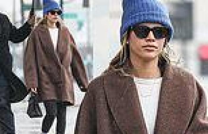 Sofia Richie braves the rain in Beverly Hills as she bundles up to emerge from ... trends now