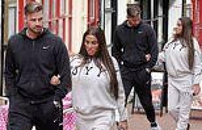 Katie Price CONFIRMS she's back together with fiancé Carl Woods as couple link ... trends now