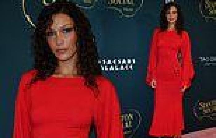 Bella Hadid shows off her svelte frame in a red gown trends now