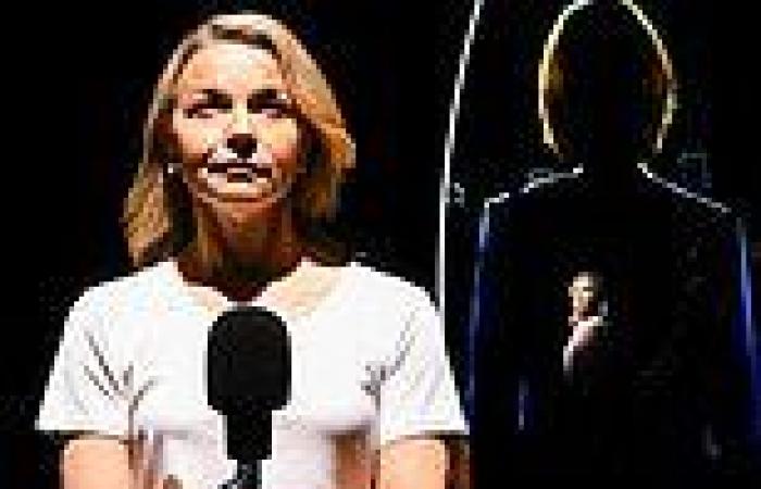 Justine Clarke poses in front of photo of former Prime Minister Julia Gillard ... trends now