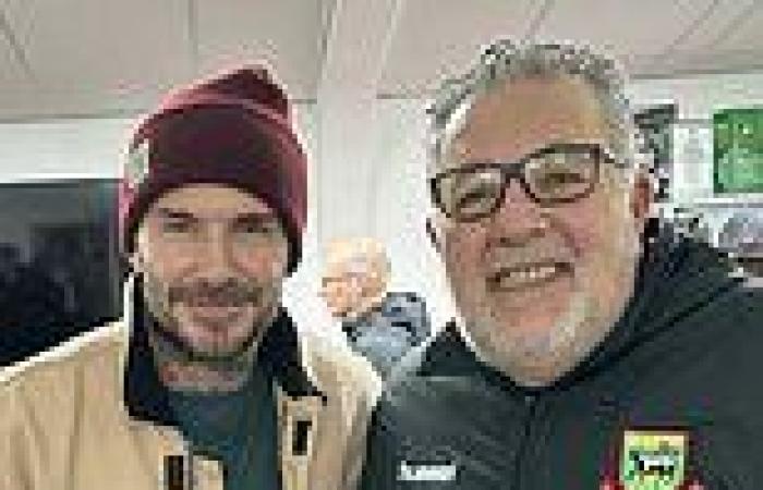sport news David Beckham poses with a fan at Hendon as son Romeo come off the bench for ... trends now