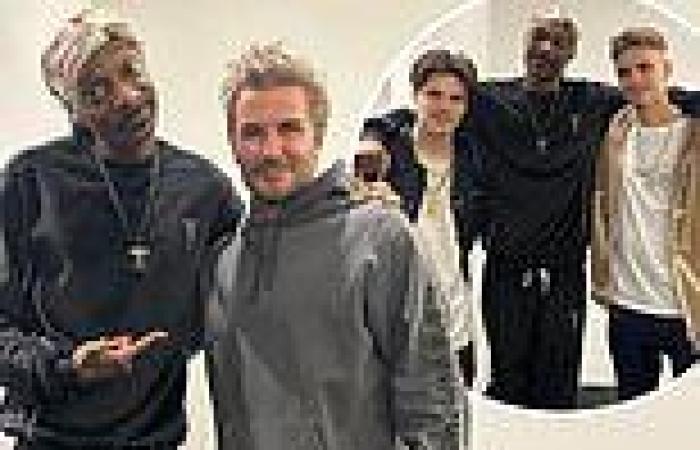 David Beckham poses for photos with Snoop Dogg as he and son's Romeo and Cruz ... trends now