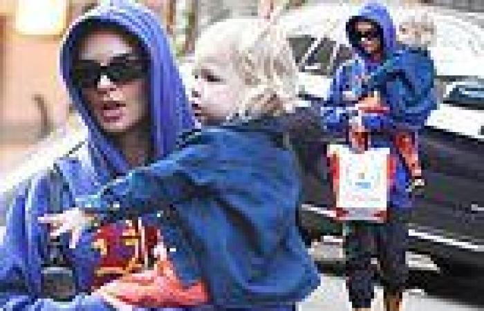 Emily Ratajkowski keeps a low-profile as she cradles son Sylvester, two, during ... trends now