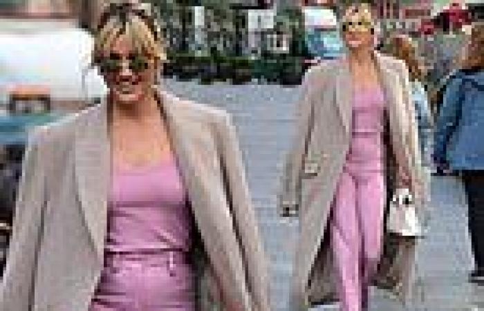 Braless Ashley Roberts looks chic in a ribbed vest top as she departs the ... trends now