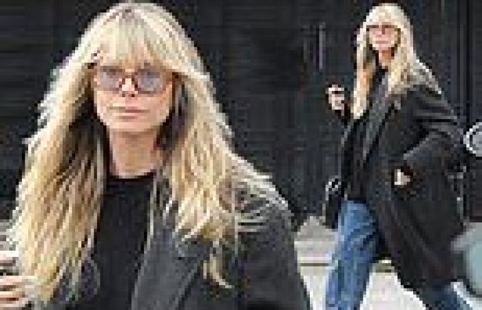 Heidi Klum stays comfortable in an oversized jacket while arriving at a beauty ... trends now