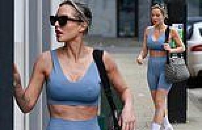 Helen Flanagan shows off her toned abs in a pale blue sports bra and matching ... trends now