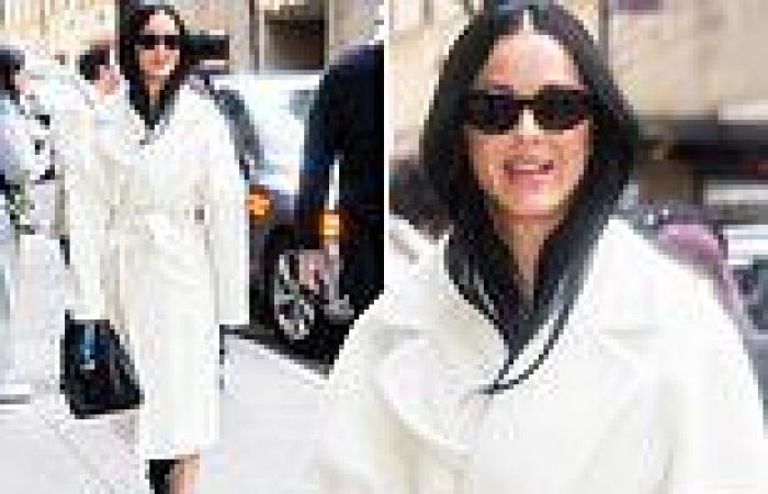 Katy Perry looks chic in white coat in New York City trends now