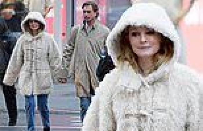 Heather Graham, 53, looks adorably cozy in furry white coat as she shops in New ... trends now