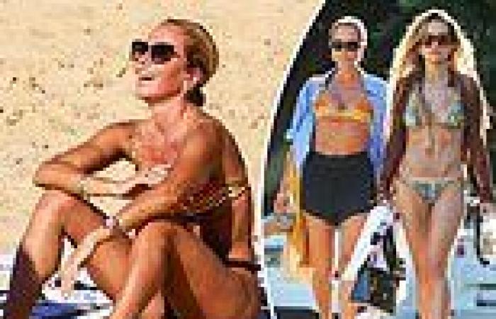 Pip Edwards shows off her fit figure in a bikini as she hits the beach in ... trends now