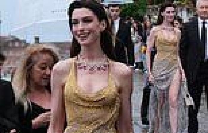 Anne Hathaway dazzles in gold sequinned gown with racy thigh-high split at ... trends now
