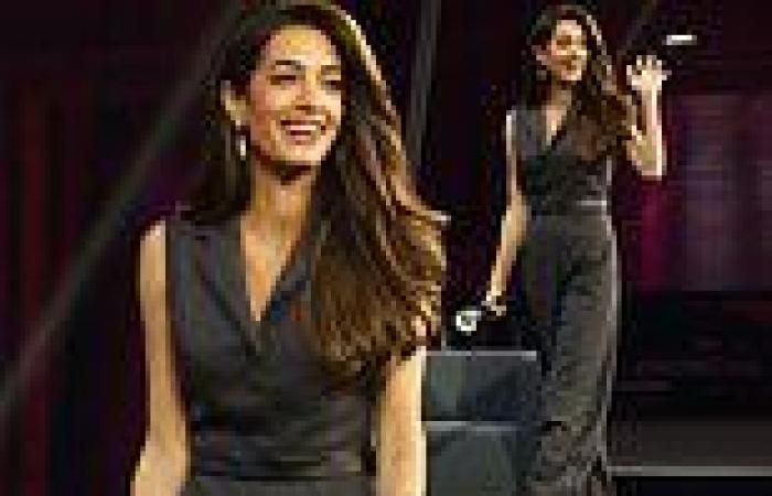 Amal Clooney looks elegant in a plunging tuxedo jumpsuit as she ... trends now
