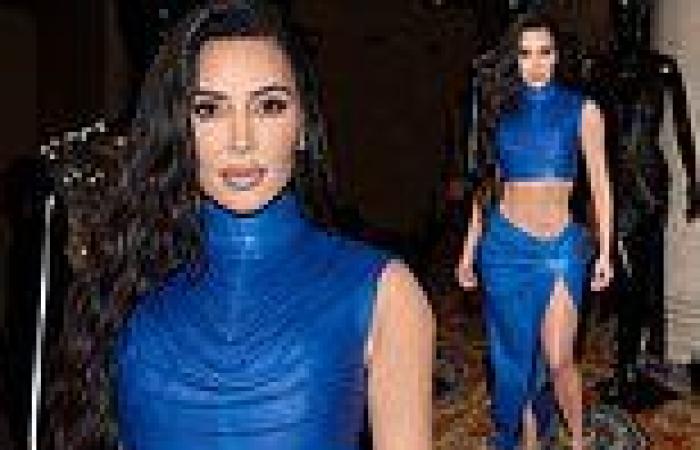 Kim Kardashian bares her midriff in a  cobalt blue crop top at the annual ... trends now