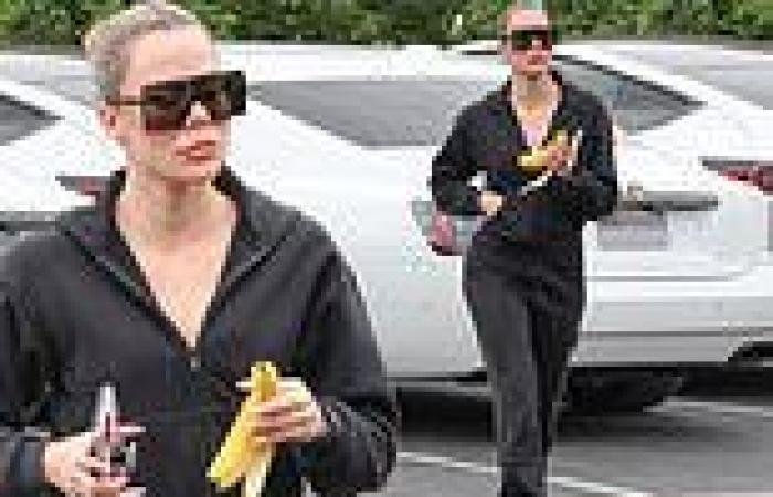 Khloe Kardashian cuts a sporty figure in a black tracksuit as she visit a laser ... trends now