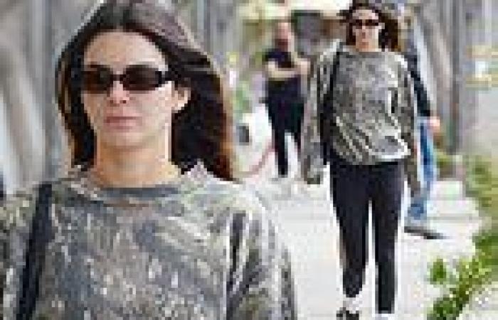 Kendall Jenner dons a camo sweatshirt and skintight black leggings as she heads ... trends now