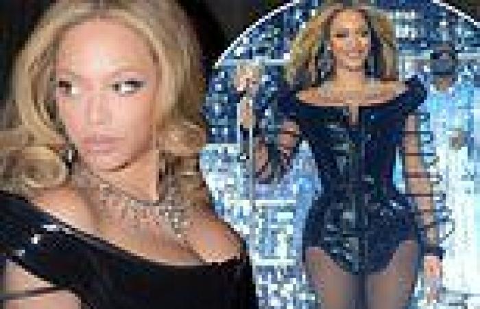 Beyonce looks incredible in a busty black PVC mini dress as she continues tour ... trends now