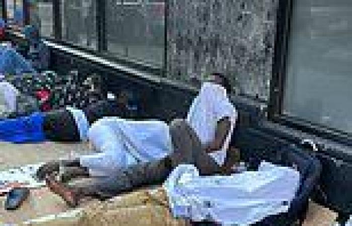 Migrant crisis NYC: Shocking photos show dozens of sleeping people lining ... trends now