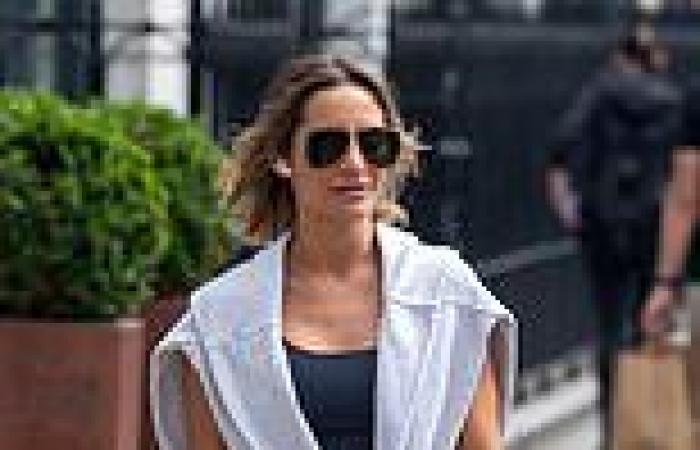 Frankie Bridge wears a sports bra and matching leggings as she goes for ...