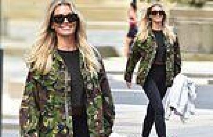 Christine McGuinness looks stylish in camo print jacket and black leggings as ... trends now