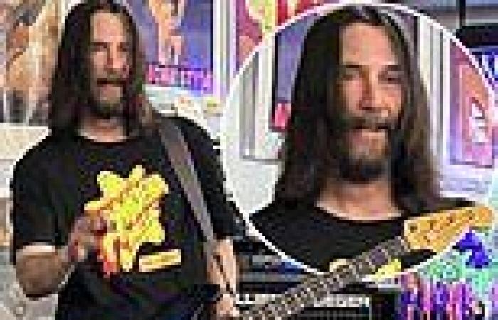 Keanu Reeves takes the stage and rocks out at Amoeba Records in Hollywood with ... trends now
