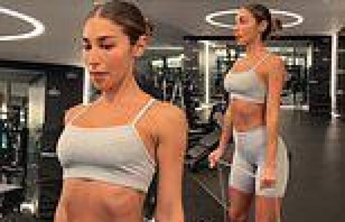 Chantel Jeffries shows off her toned abs in a grey crop top and bike shorts as ... trends now