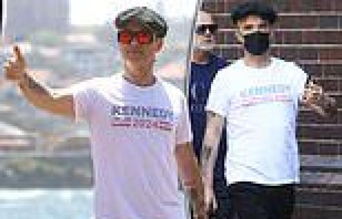 Robbie Williams cuts a casual figure in a face mask as he takes a stroll around ... trends now