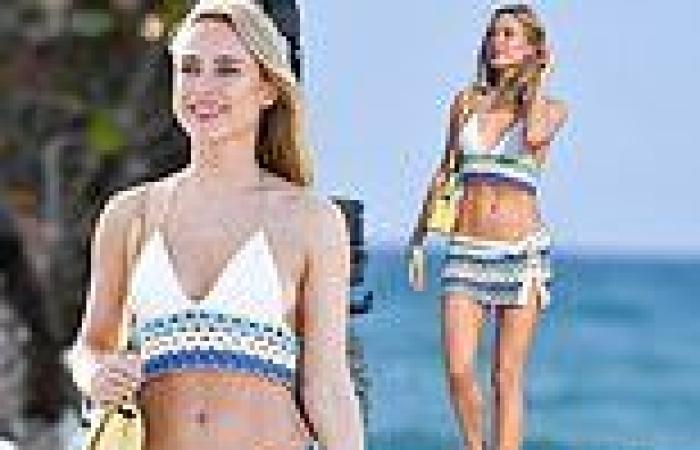 Kimberley Garner shows off her jaw-dropping figure in a white and blue crochet ... trends now