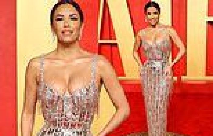 Eva Longoria struggles to contain her assets in a gold and silver low-cut gown ... trends now