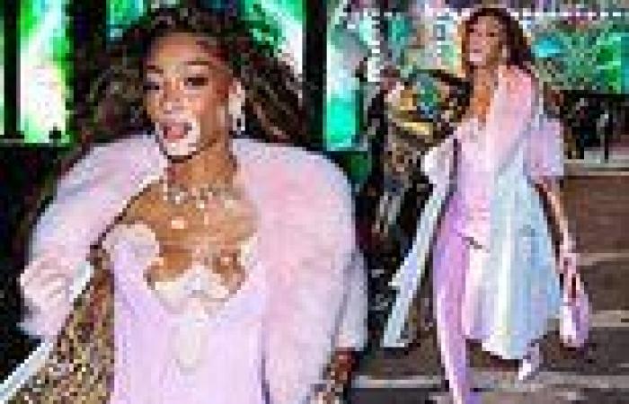 Winnie Harlow stuns in a TINY mini dress and thigh-high boots as she attends ... trends now