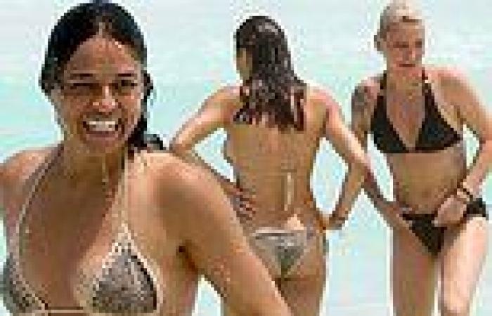 Michelle Rodriguez and Carmen Vandenberg don tiny bikinis and hold hands as ... trends now