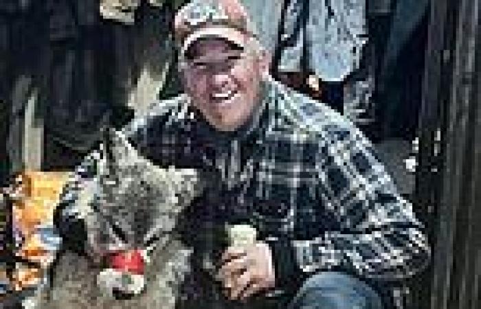 Wyoming hunter, 42, poses with exhausted wolf he tortured and paraded around ... trends now