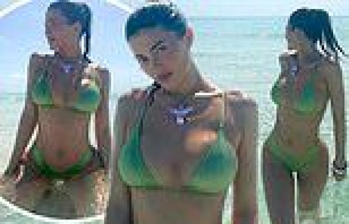 Kylie Jenner shows off her tiny waistline in a mint green string bikini while ... trends now
