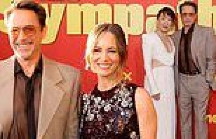 Robert Downey Jr. beams alongside wife Susan as he joins his co-star Sandra Oh ... trends now
