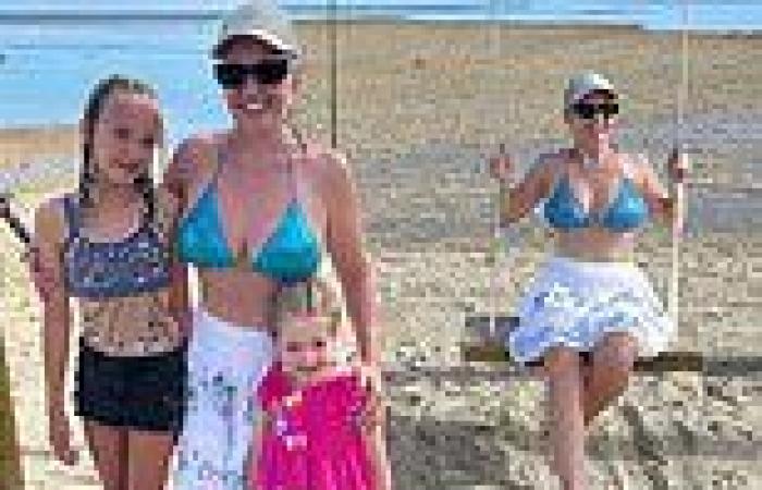 Fifi Box, 47, shows off her youthful figure in a skimpy blue bikini as ... trends now