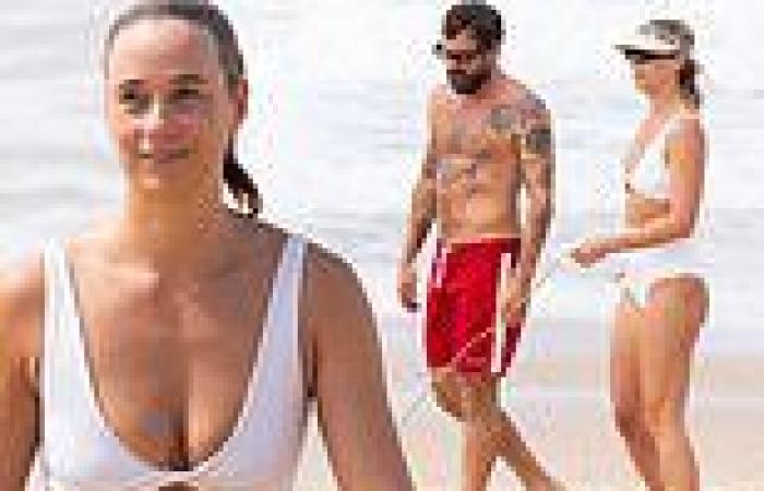 Jade Yarbrough shows off her sensational figure in a white bikini as she hits ... trends now