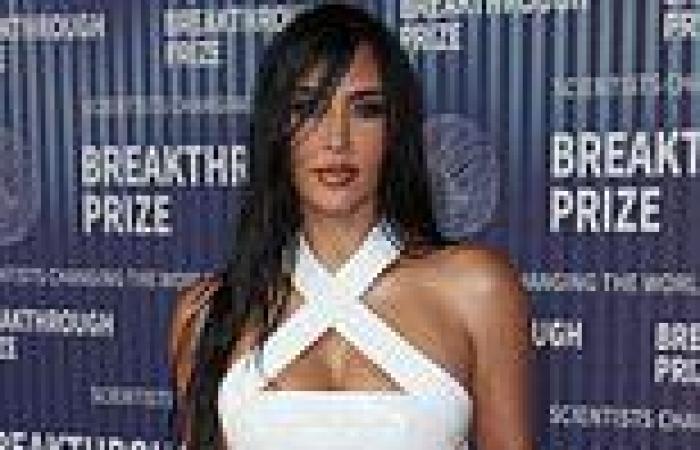 Kim Kardashian slips her bombshell curves into a white leather gown as she ... trends now