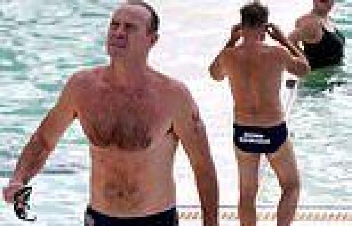 Neighbours icon Jason Donovan, 55,  shows off his toned physique in a pair of ... trends now