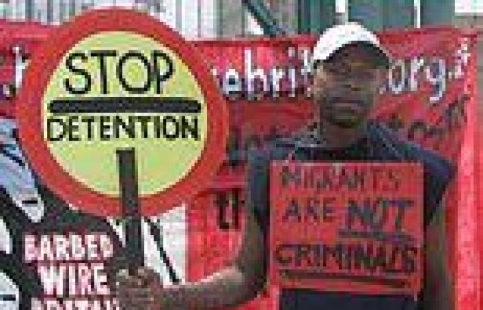Failed asylum seeker, 40, who wore a sign saying 'migrants are not criminals' ... trends now