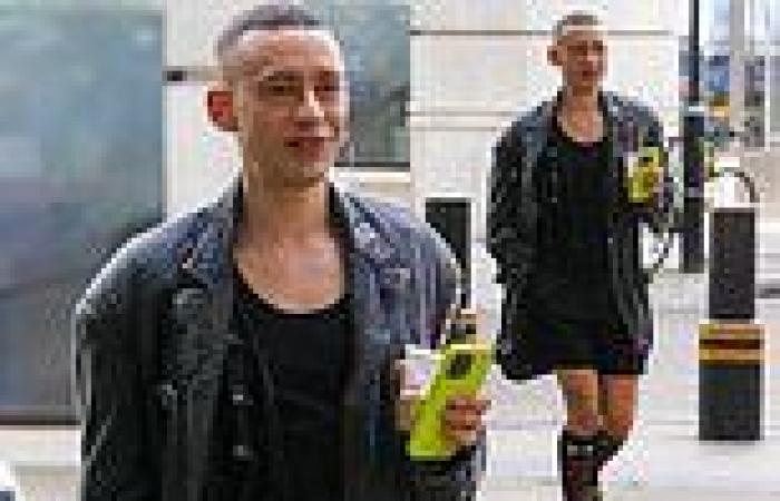 Eurovision's UK act Olly Alexander cuts a quirky figure in shorts and long ... trends now