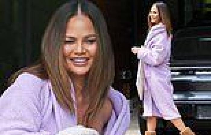 Chrissy Teigen looks cozy in a lavender robe and Uggs as she steps out in LA... ... trends now