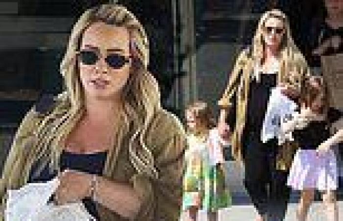 Pregnant Hilary Duff holds hands with daughters Banks, 5, and Mae, 3, during ... trends now