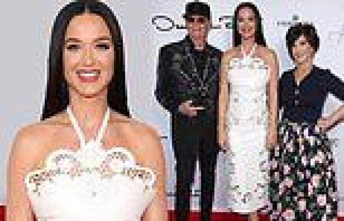 Katy Perry dazzles in chic white ensemble alongside her parents on the red ... trends now
