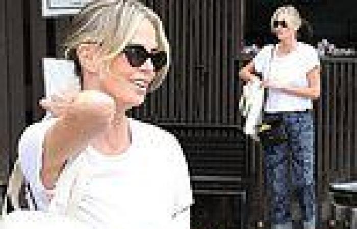 Charlize Theron cuts a casual figure in a T-shirt and patterned jeans after ... trends now