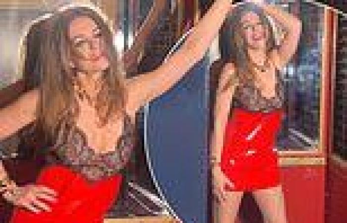 Elizabeth Hurley looks incredible in a sheer lace and red latex mini dress as ... trends now