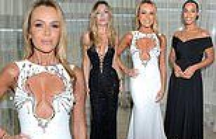 Amanda Holden flashes her cleavage in a cut-out white gown while Abbey Clancy ... trends now