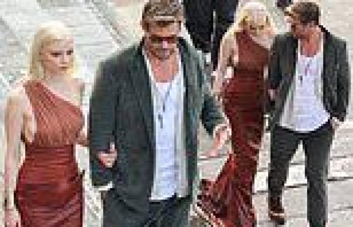 Chris Hemsworth shows off his chivalrous side as he offers his arm to support ... trends now