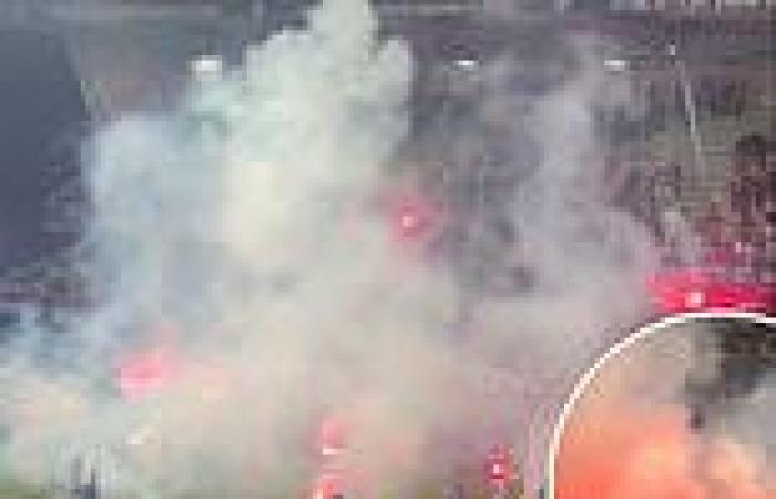 sport news French match is ABANDONED after furious Troyes fans throw flares on the pitch ... trends now