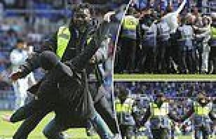 sport news Birmingham fans invade the St Andrews pitch and clash with stewards... as the ... trends now