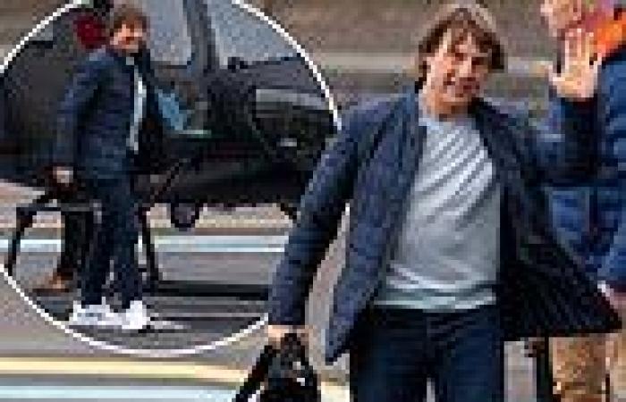 Tom Cruise, 61, flashes a smile as he lands his helicopter in London as filming ... trends now