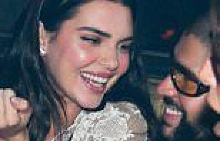 Kendall Jenner and Bad Bunny sit VERY close together as they beam at each other ... trends now